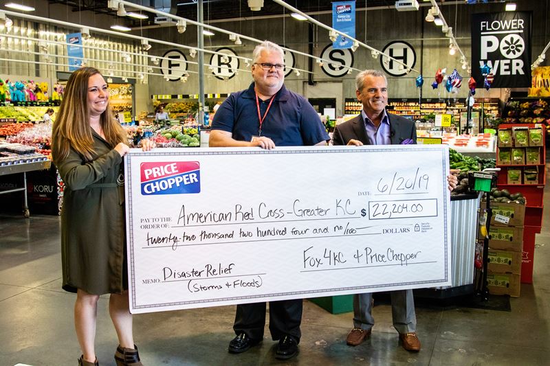 Price Chopper presents donation check to American Red Cross with partners from Fox 4 KC.